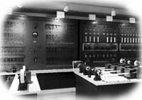 Images of historical fire alarm control rooms and panels from the past three centuries.