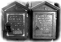 Vintage Gamewell fire alarm boxes displayed in a museum